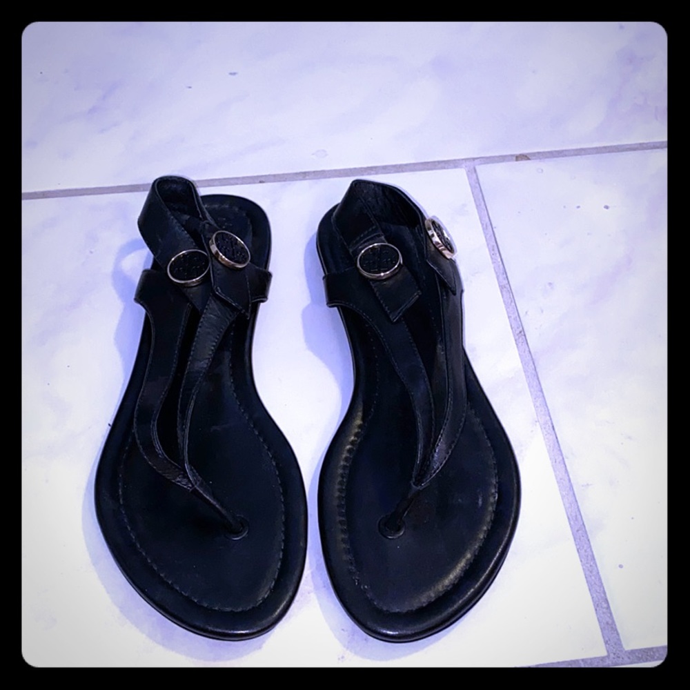 Tory Burch black flat sandals with T detail.Size 7